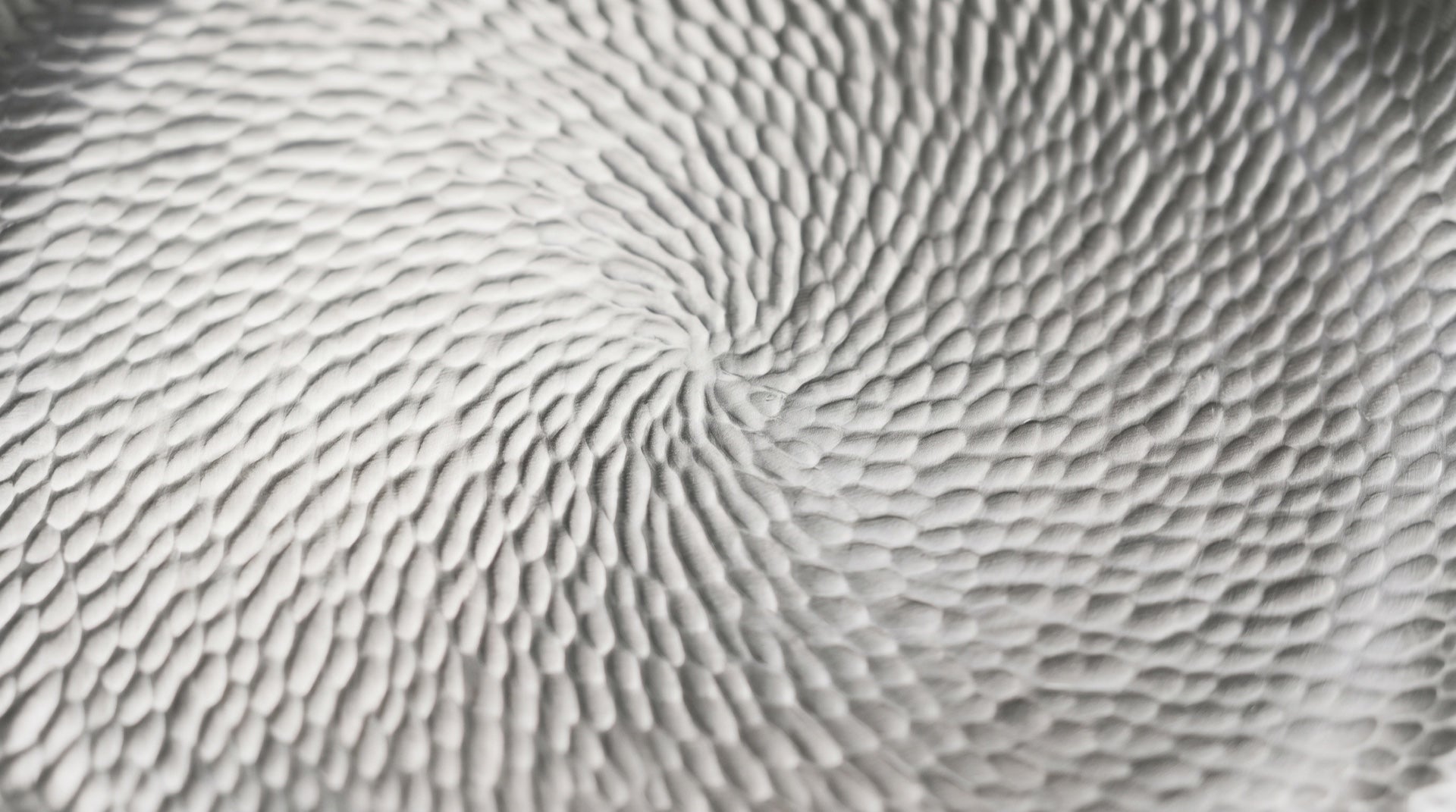 Détail de la surface en titane MIJOTA