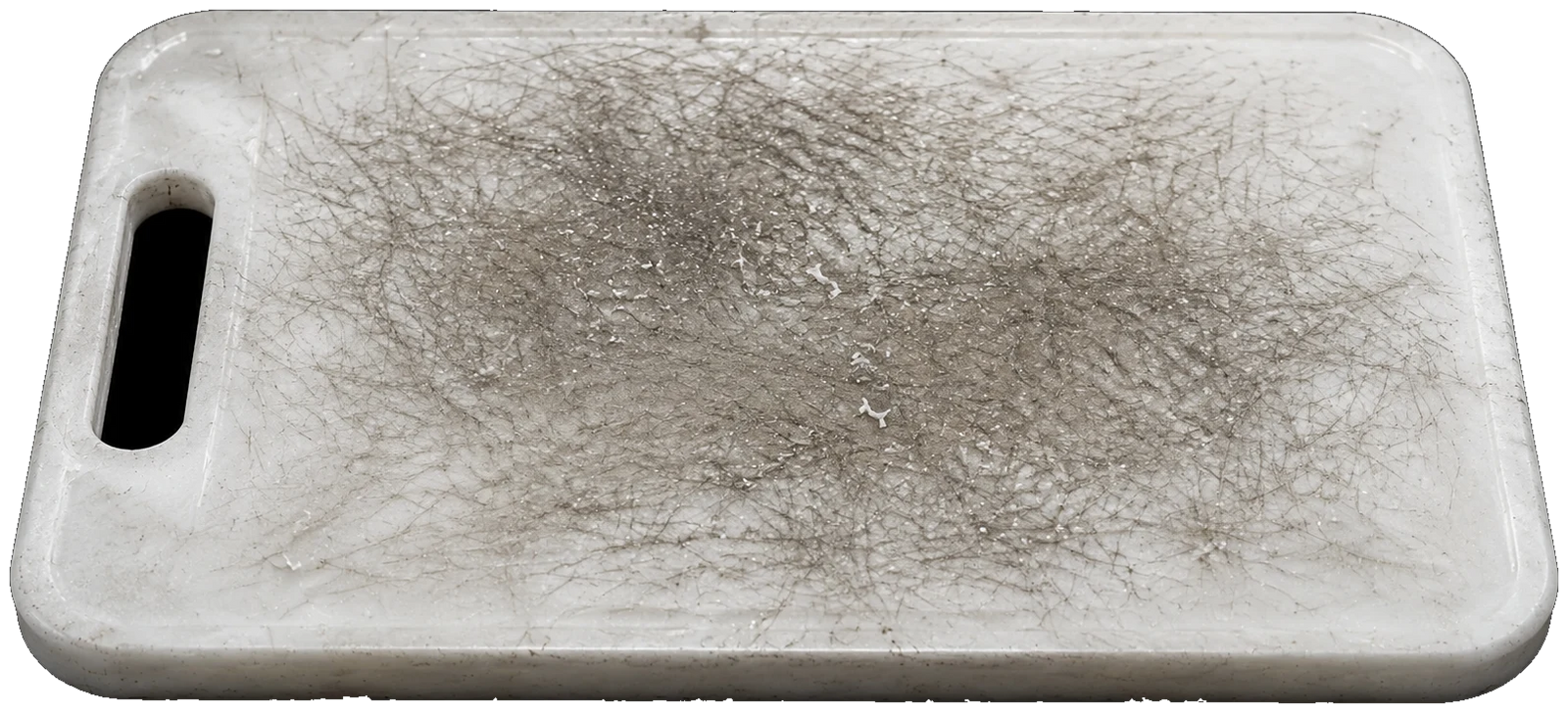 Planche en plastique usée avec rainures, rayures et particules de découpe